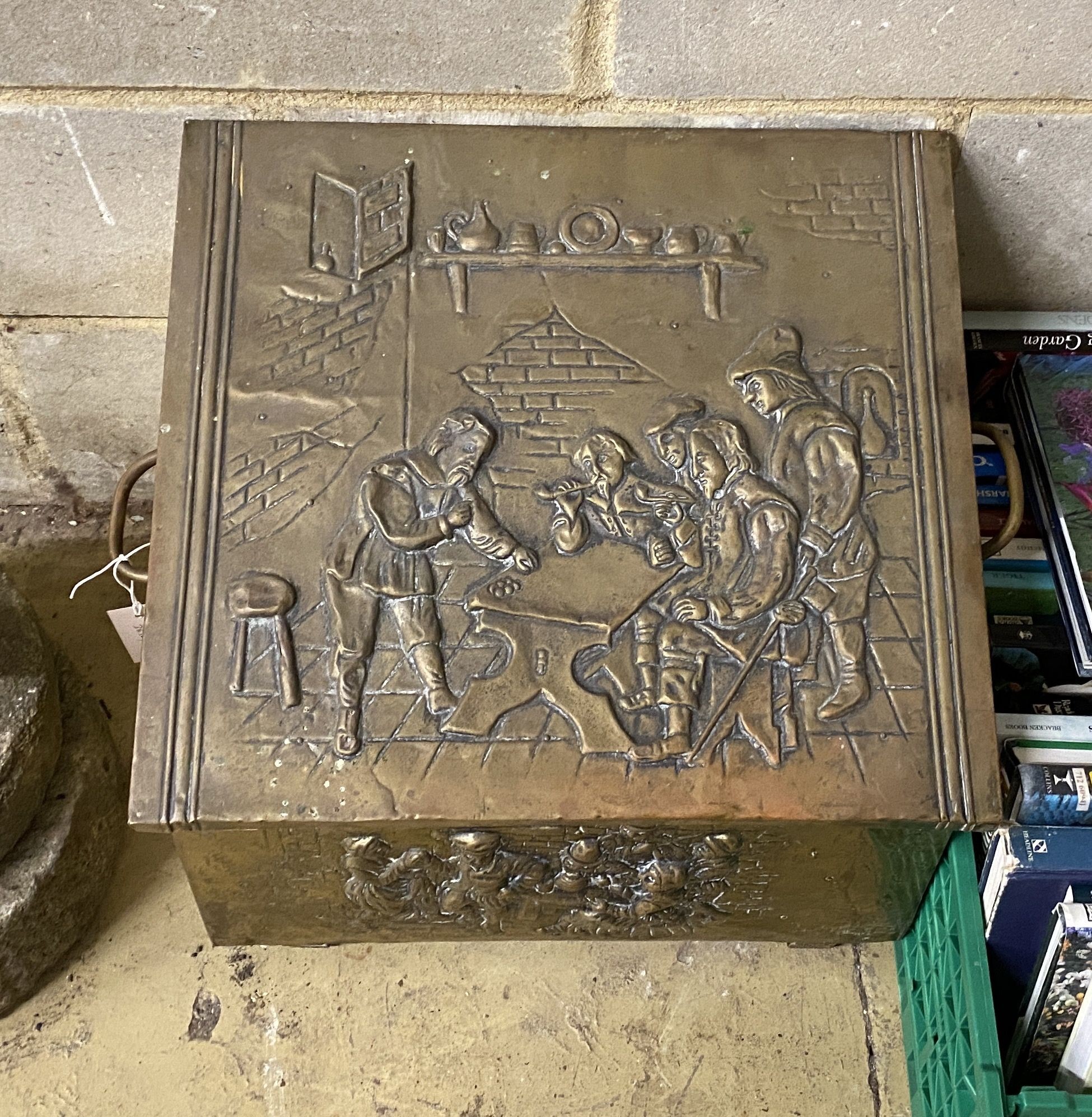 An antique Dutch embossed brass coal bin with handle, width 60cm, height 44cm